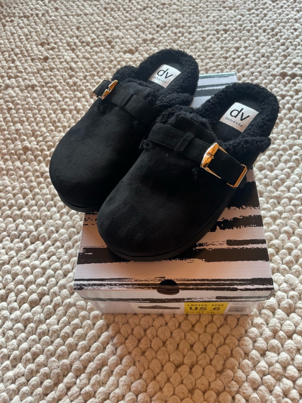 DV by Dolce Vita Black Faux-Shearling Slip-Ons with Gold Buckle